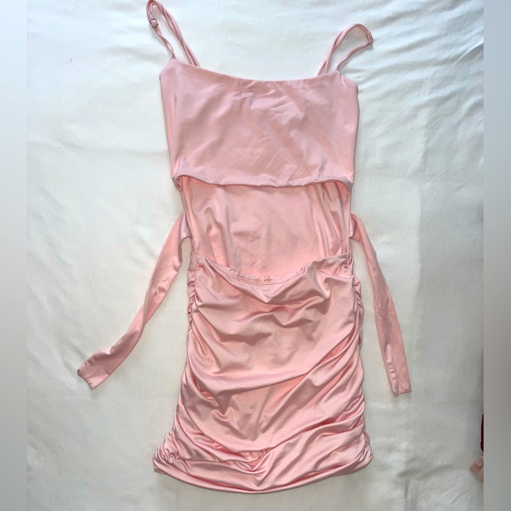 Lucy's pink cut out dress